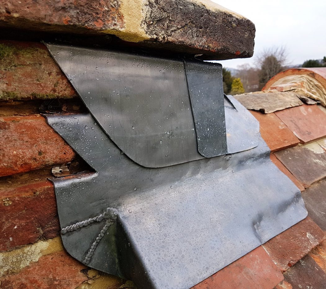 leadwork for brick and clay tile roof Surrey Sussex